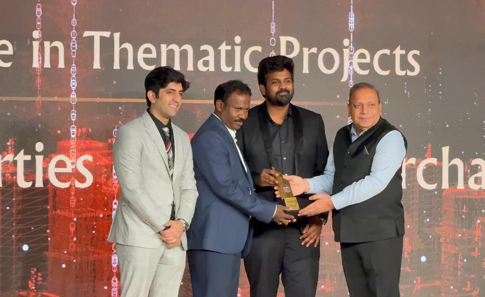 Vision's Orchard receiving the Excellence in Thematic Projects award
